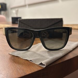 Gucci sunglasses black and gold